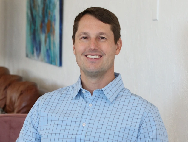 Smiling portrait of Dr. David Lawrence at Warwick Dental in Oklahoma City
